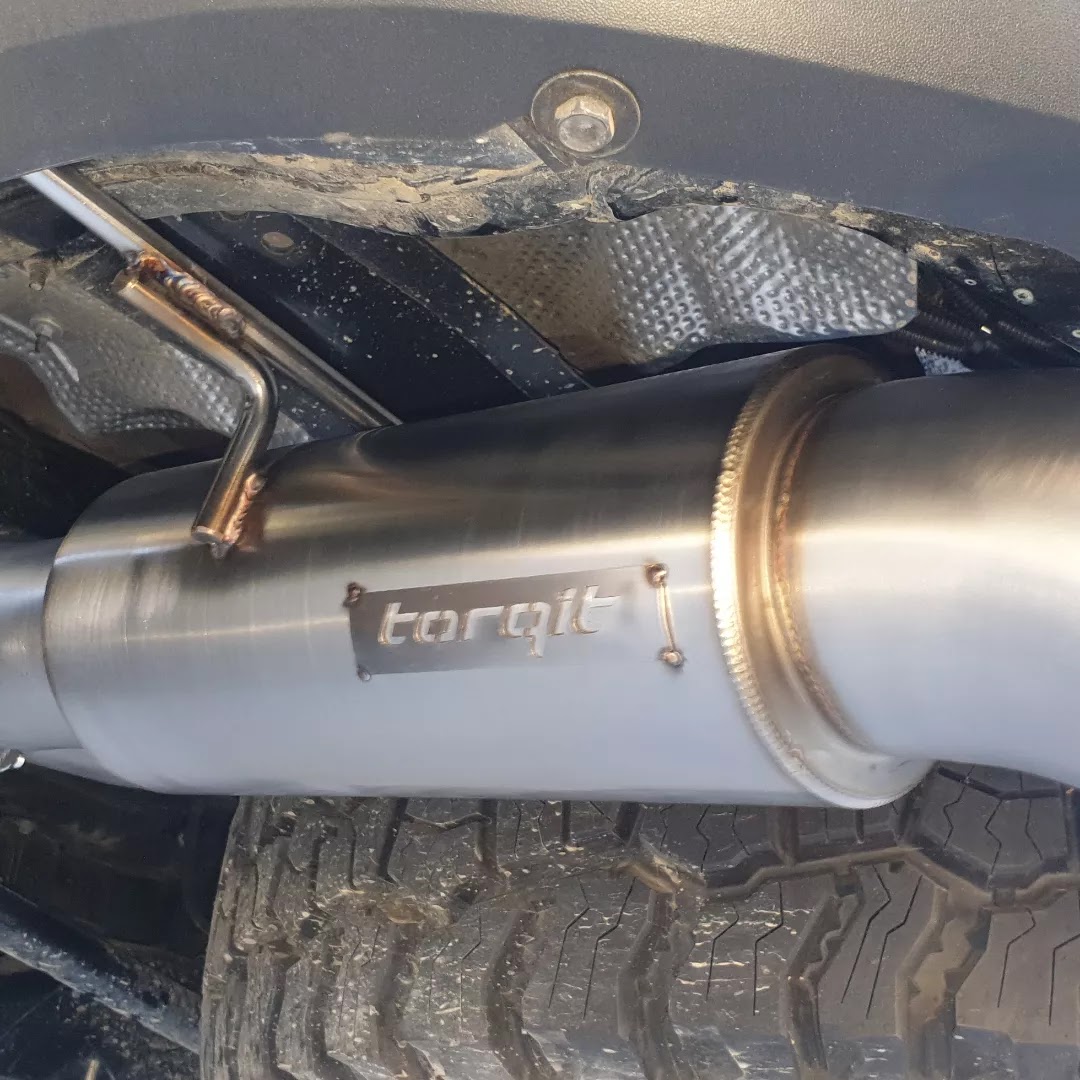 A Torqit stainless exhaust system fitted under a four wheel drive