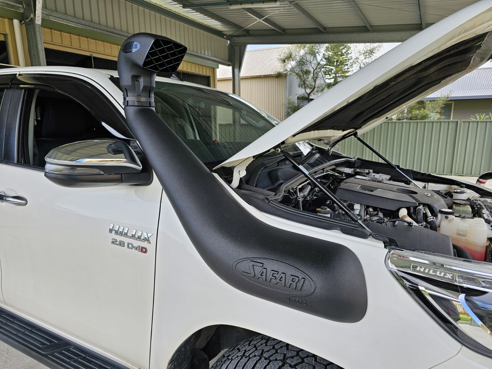 A Safari Armax snorkel fitted to a Toyota Hilux with the bonnet raised